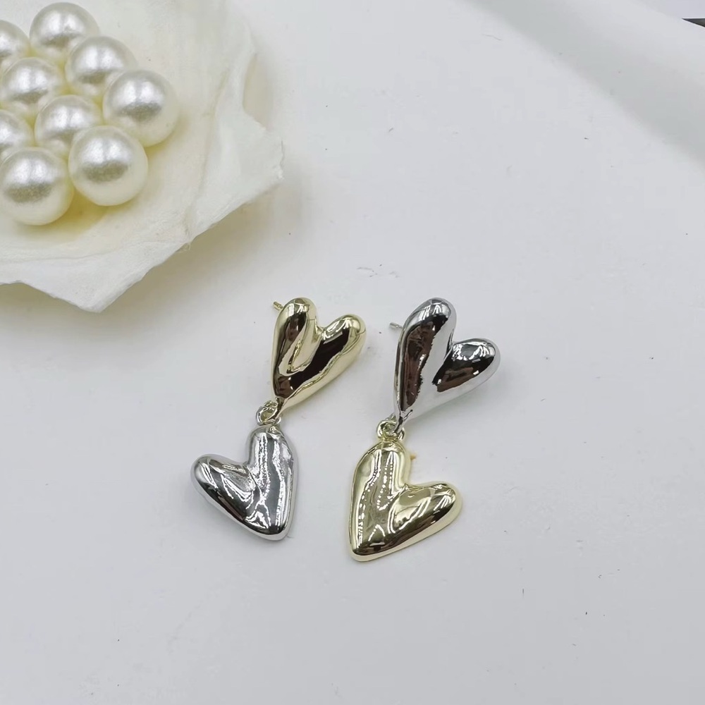 Minimalist Design Gold and Silver Heart Earrings - Picture 8 of 9